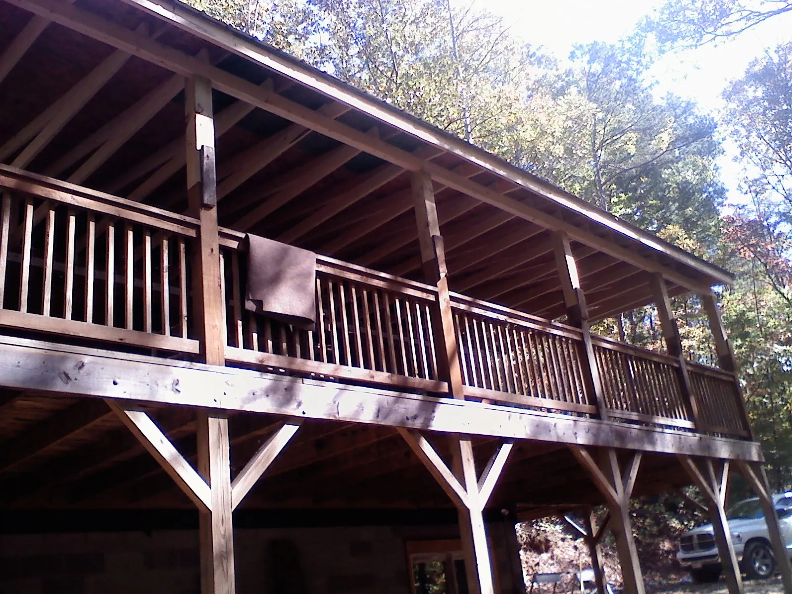 Timber framing under a new elevated porch and deck — Roof Leak Repair in Panama by Roofing Brothers